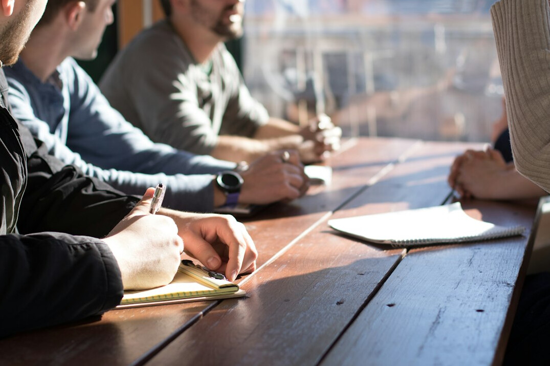 group discussing trends in meeting