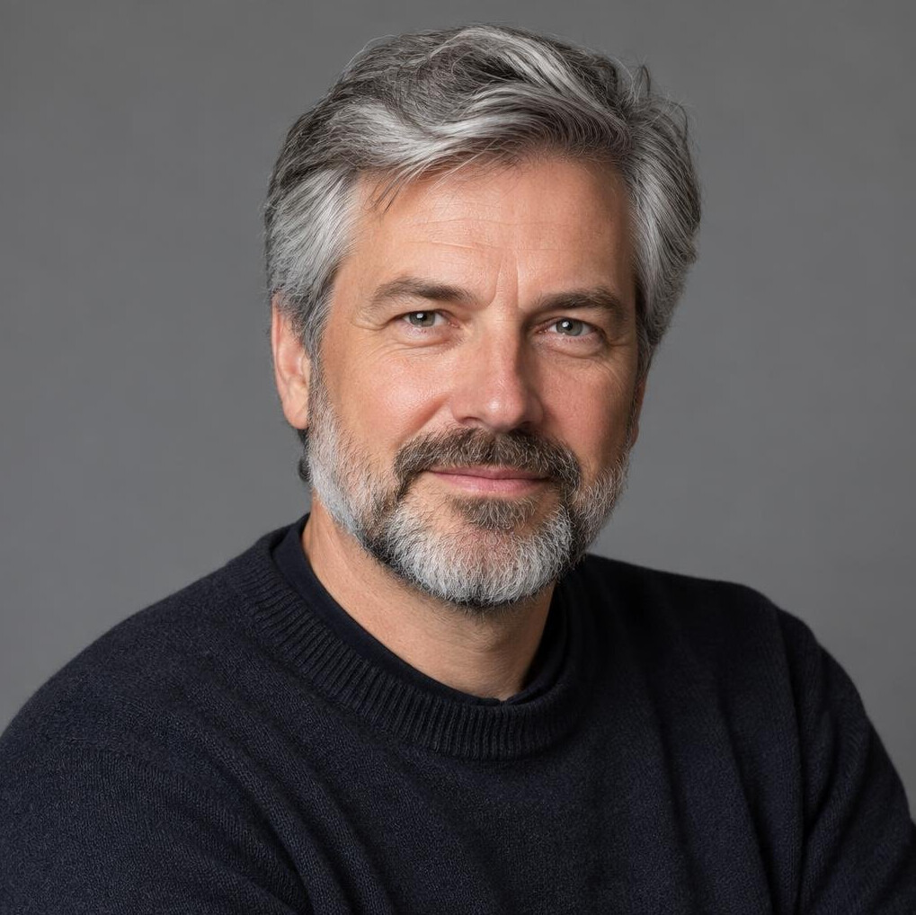 Studio portrait of a German male sociologist in his 50s